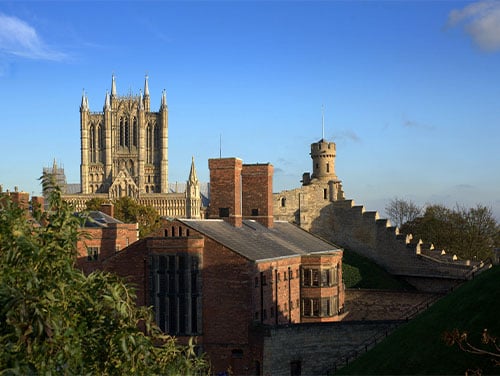 Lincoln Cathedral with trees in the foreground